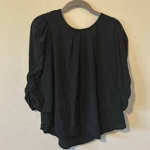 Black blouse by Blashe, size M.